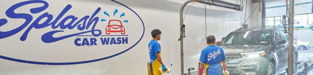 Two men observing carwash